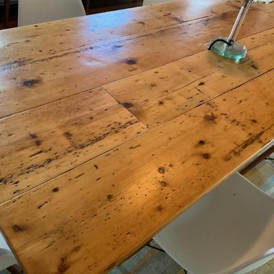 Custom dining table measures 34.5â€ x 83â€ x 29.