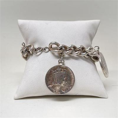 Lot 074   3 Bid(s)
Sterling Silver Curb Chain Bracelet with Three French Coin Charms