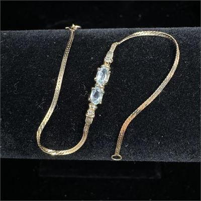 Lot 055   4 Bid(s)
14K Gold and Aquamarine Style Rhinestone Delicate Vintage Bracelet