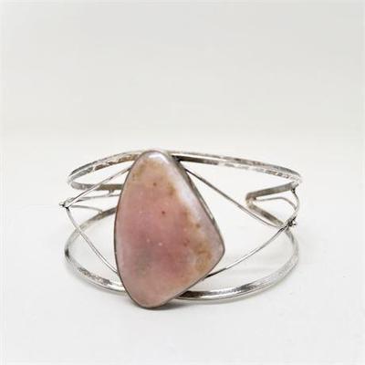 Lot 062   1 Bid(s)
Hand Made Sterling Cuff Bracelet with Raw Pink Opal Stone