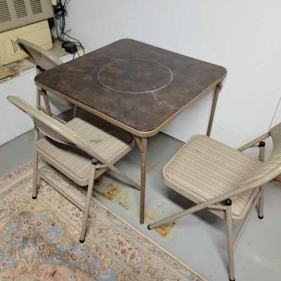 #1802 â€¢ Foldable Table and (3) Foldable Chairs
