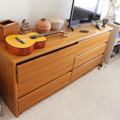 The guitar may not be available for sale. Picture of the dresser here...
