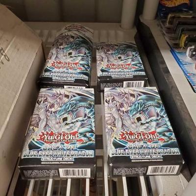 #7141 â€¢ 4 Boxes of Yu-Gi-Oh! Trading Cards
