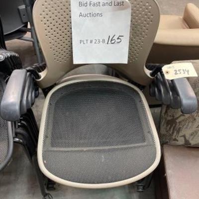 #2534 â€¢ 5 Tan and Black Office Chairs with Wheels
