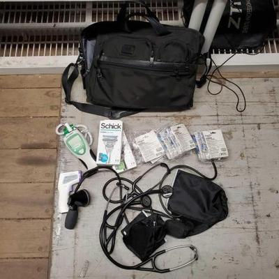 #7132 â€¢ Bag With Thermometers, Blood Pressure Cuffs, Stethoscopes, Vapor Inhaler, Schick Razors
