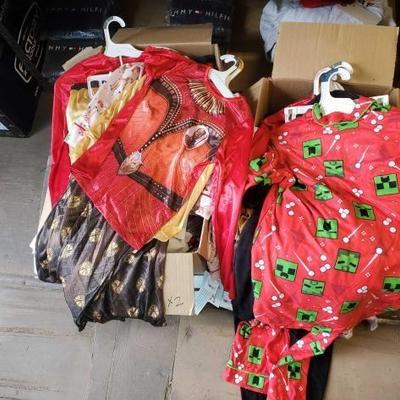 #3018 â€¢ NEW!!! 2 Boxes of Children's Holiday Pajamas and Costumes
