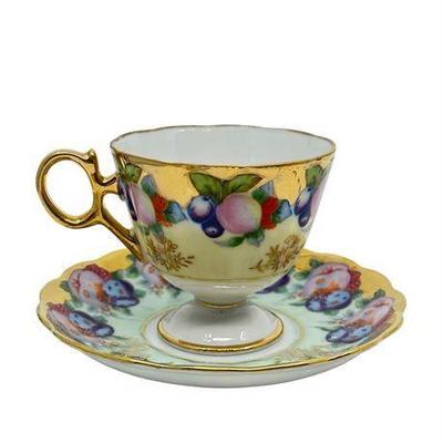 Lot 108  
Porcelain Royal Sealy Fine China Teacup and Saucer Set