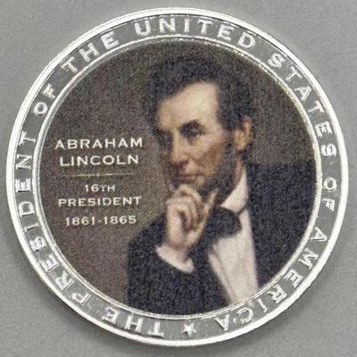 Abraham Lincoln Colorized Coin
Material Cu Silver-Plated w/ Padprint 
Weight 32g