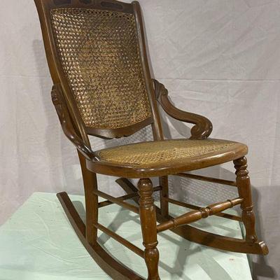 walnut and cane seat rocking chair