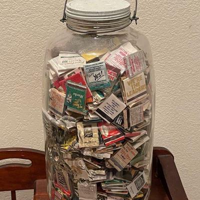 huge mason jug of matchbooks 