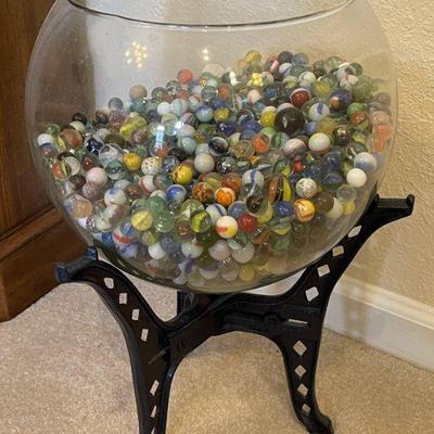 wrought iron stand with marbles in bowl