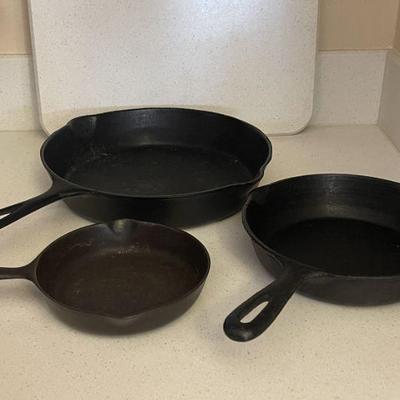 3 cast iron skillets