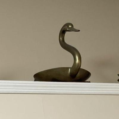3 brass swans