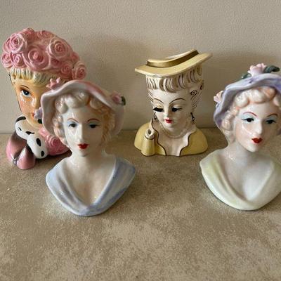 selection of Lady head vases 