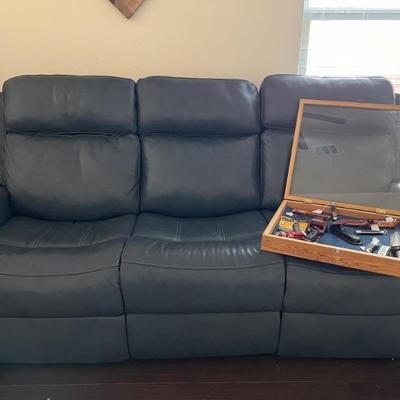 Leather sofa with electric controls