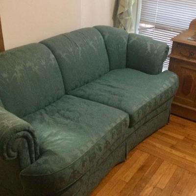 Green upholstered Sofa