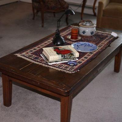 three board coffee primitive style table. In the style of but not antique 