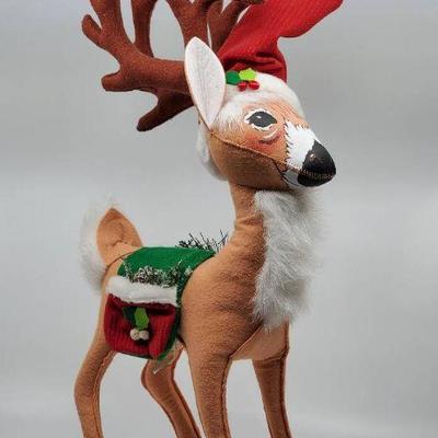 Lot 108-AL: Annalee 23â€ Reindeer

Includes: 
â€¢	2009 23â€ Reindeer (n/a).
Tall Reindeer wearing a Santa hat and an holly-adorned...