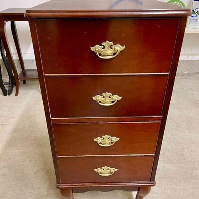 Lot 047-G: Two-Drawer Filing Cabinet

Features: 
â€¢	Cherry finish
â€¢	Letter-size
