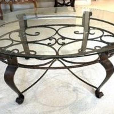 Gorgeous Glass Top Coffee Table offers a lovely ornate design.

Measuring 49 x 37 x 19 inches, this is one great looking table! 