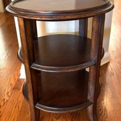 Decorative Three Tiered Wooden Accent Table by Woodbridge 

Measures 28 inches tall and 22 inches in diameter. A very nice sized accent...