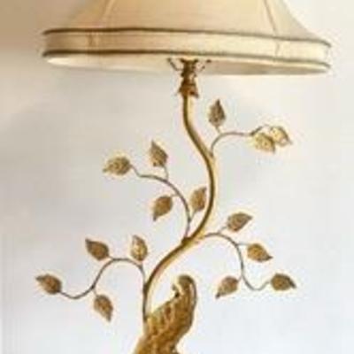 Bradburn Home Elms Novelty Table Lamp in a lovely gilded design consisting of leaves and a beautiful bird. 

Measures about 30 inches tall