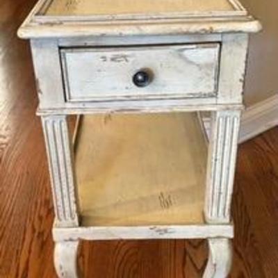 Darling Distressed Accent Table with Drawer by Woodbridge Furniture evokes a romantic French country feel.

Measures 22 x 13 x 24 inches....