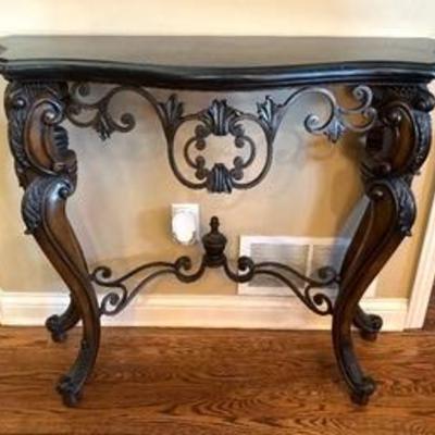 This Outstanding Ornate Accent Table measures 40 x 15 x 34 inches and is beautiful from every angle!