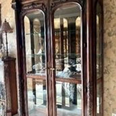 Spectacular Hendredon Display Cabinet is something to be seen!  This stately cabinet features exceptional carved details in the wood that...