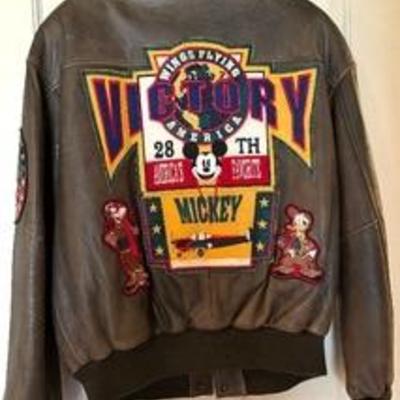 Rare Disneyland Disney Victory Mickey Mouse Brown Leather Jacket 

Item in used,\/very good condition. 

Size Medium

Circa 1990's