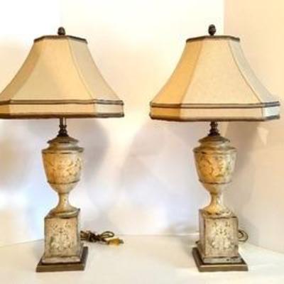 Pair of Elegant Table Lamps in a very lovely design

Each measuring about 31 inches tall. 