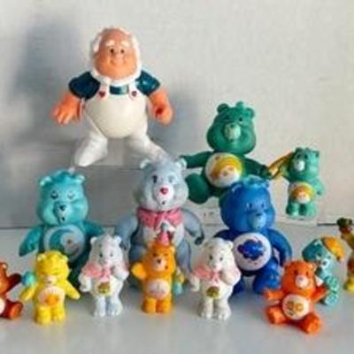 Variety of Vintage Collectible Carebear Figurines including Cloudkeeper and Grams Carebear

The adorable characters in this lot measure...