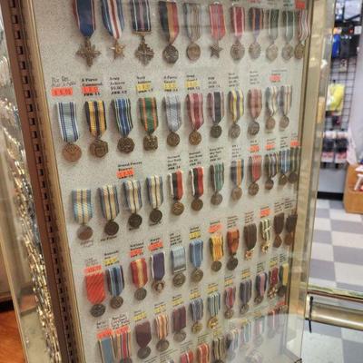 Large Assortment of Military Medals in Display Case