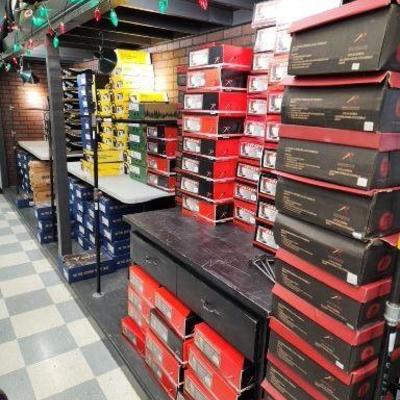 Assortment of New Shoes in Boxes
