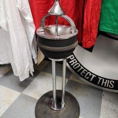 Vintage Cigarette Ash Tray and has actual cigarette butts still in the container.