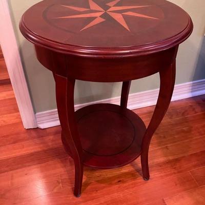 Bombay 18" Round Side Tables.  25" H and has a bottom shelf.  There are 2 of these that will be sold separately.