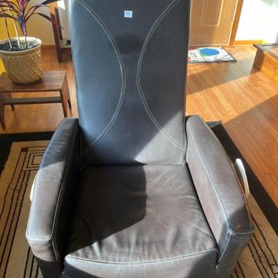16:Leather gaming chair. Swivels and folds up.
