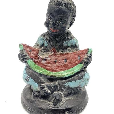 Vtg. cast iron boy eating watermelon, ht. 3 3/4 