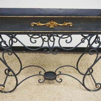 1121	LARGE METAL PLANTER ON FANCY WROUGHT IRON BASE, APPROXIMATELY 49 IN X 17 IN X 34 IN H
