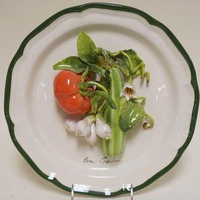1030	EVA GORDON CERAMIC PLATE WITH APPLIED VEGETABLES, APPROXIMATELY 12 IN
