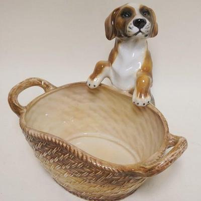 1038	ITALIAN CERAMIC PUPPY ON BASKET CENTERPIECE, APPROXIMATELY 14 IN X 10 IN X 11 IN

