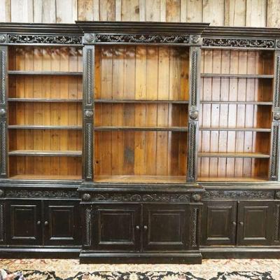 1160	COUNTRY FRENCH PINE STEP BACK BOOKCASE CABINET WITH CARVED FRETWORK TOP IN EBONIZED FINISH, APPROXIMATELY 121 IN X 20 IN X 95 IN H
