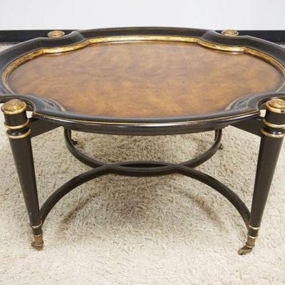 1092	MAITLAND SMITH COCKTAIL TABLE WITH BURL WOOD TOP HAVING EBONIZED AND GILT TRIM ACCENTS, APPROXIMATELY 40 IN X 32 IN X 20 IN H
