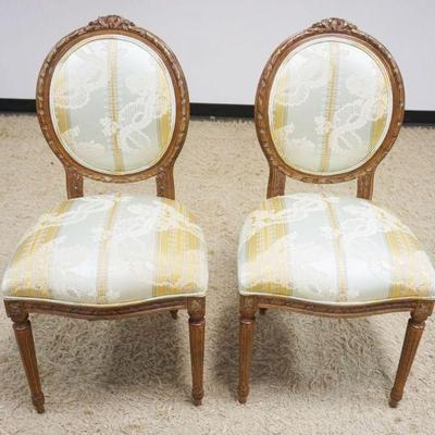 1147	PAIR OF ITALIAN UPHOLSTERED AND CARVED SIDE CHAIRS WITH GILT ACCENT TO FINISH
