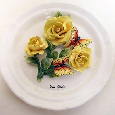 1026	EVA GORDON CERAMIC PLATE WITH APPLIED FLOWERS AND BUTTERFLYS, APPROXIMATELY 12 IN
