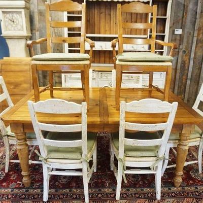 1163	COUNTRY FRENCH PINE TABLE WITH 2 LEAVES AND 6 RUSH SEAT CHAIRS, TABLE APPROXIMATELY 70 IN X 44 IN X 31 IN, LEAVES 20 IN
