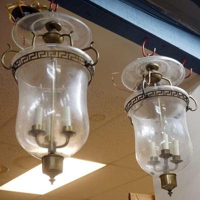 1203	PAIR OF HANGING BRASS LAMPS WITH HURRICANEGLASS & SMOKE BELLS, APPROXIMATELY 26 IN H
