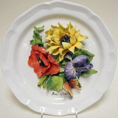 1025	EVA GORDON CERAMIC PLATE WITH APPLIED FLOWERS AND BUTTERFLY, APPROXIMATELY 12 IN
