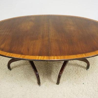 1106	BAKER MAHOGANY OVAL BANDED EXTENSION TABLE, NO LEAVES, APPROXIMATELY 66 IN X 42 IN X 30 IN H
