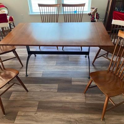 Ethan Allen Table has two and pads.  Also has two armed chairs and 4 side chairs
